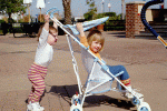 Hilde pushing Maeve in stroller