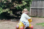 Hilde playing in her Easter clothes