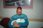 Daniel in the sterile gown after delivery