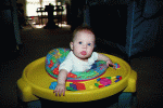 Playing in the ExerSaucer